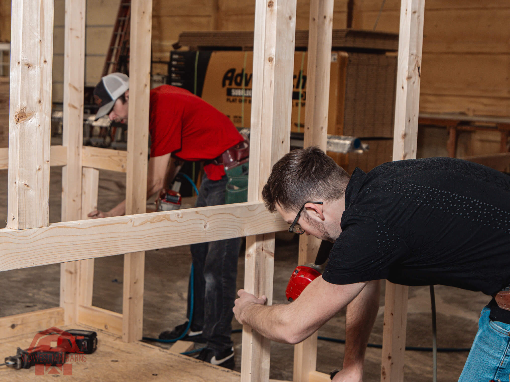 The Midwest Mini Barns crew building a shed in the Winston, Missouri shop